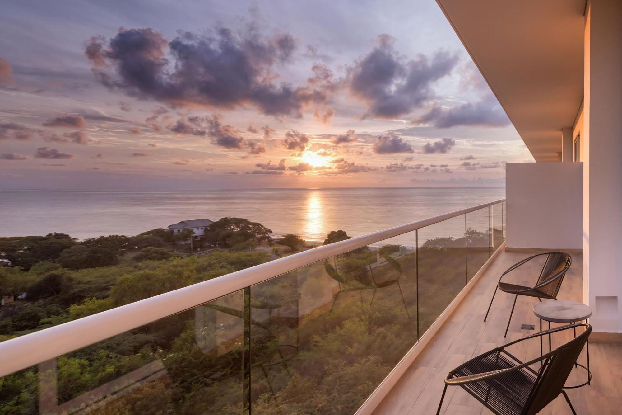 Santa Marta Marriott Resort Playa Dormida Екстер'єр фото Sunset view from a balcony